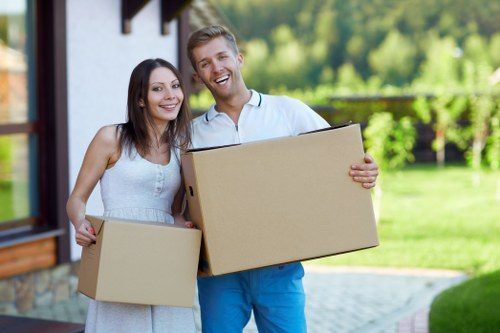 Packed office boxes and furniture arranged for a business relocation